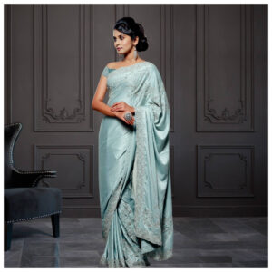 Pastel blue crepe silk saree.